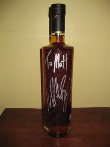 Ludacris autographed Conjure cognac bottle